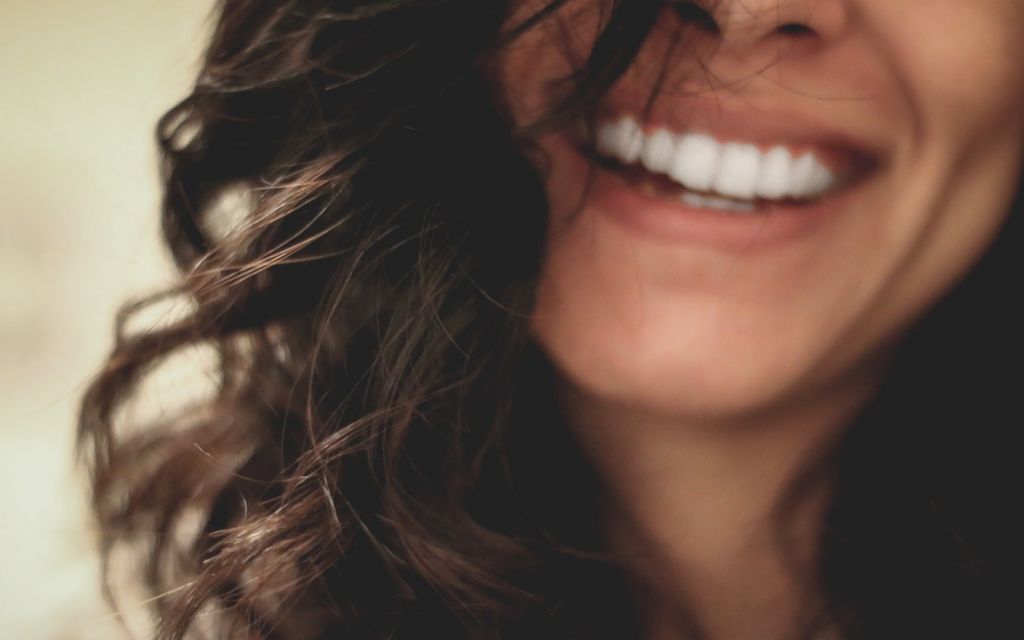 Close up of a brunette woman's smile